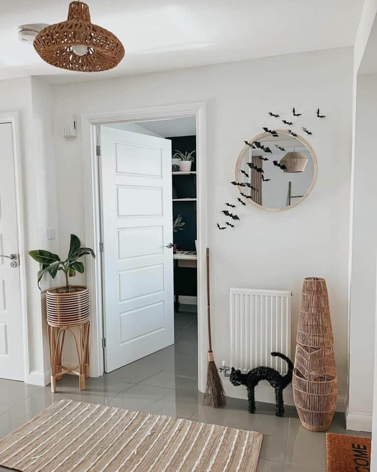 White Entryway with Black Cat Decor